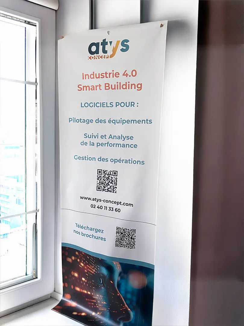 Impression de bâche événementielle avec œillets et fourreau pour Atys Concept à La Baule – PAO et préparation fichier